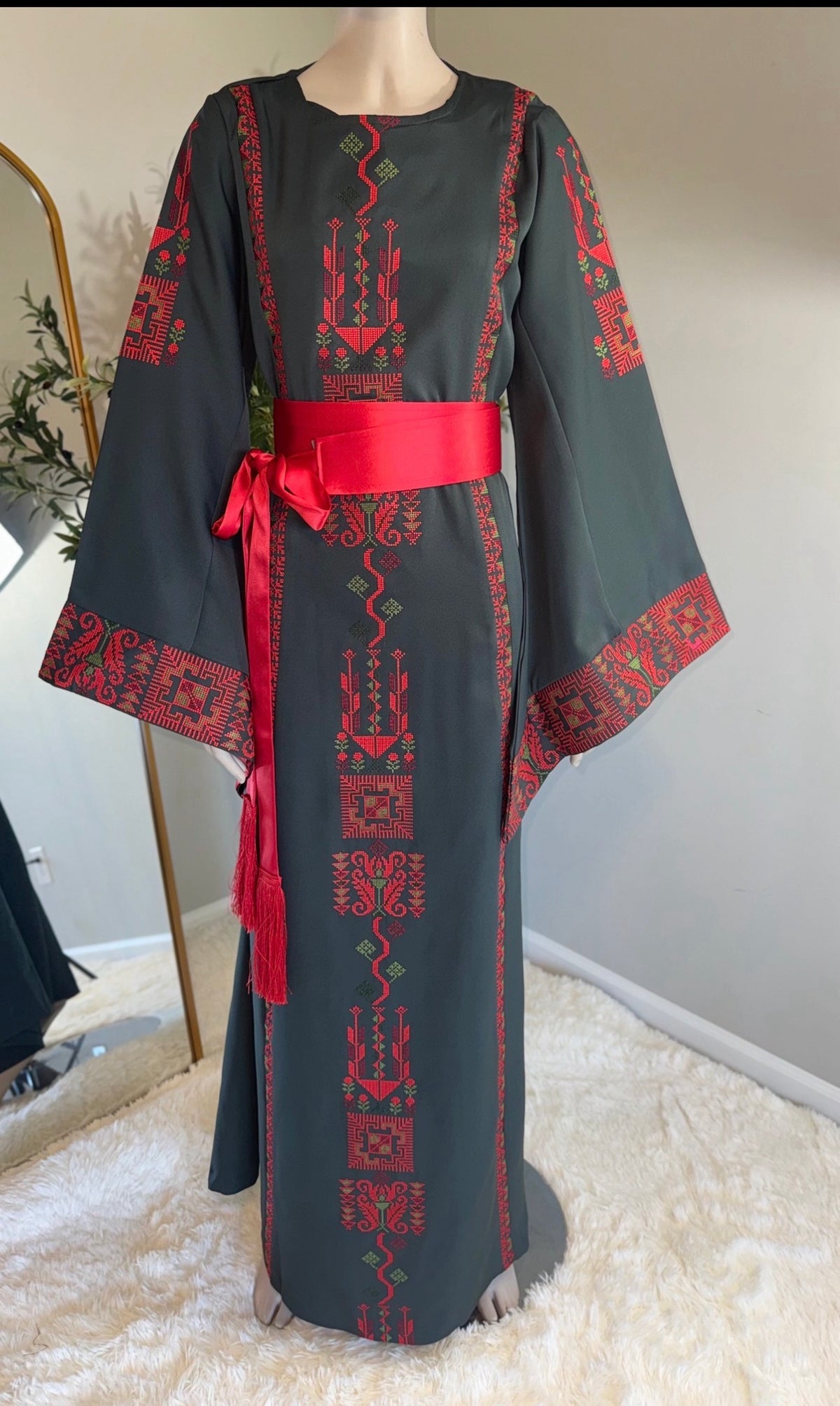  Grayish, green fabric embroidered dress with matching belt