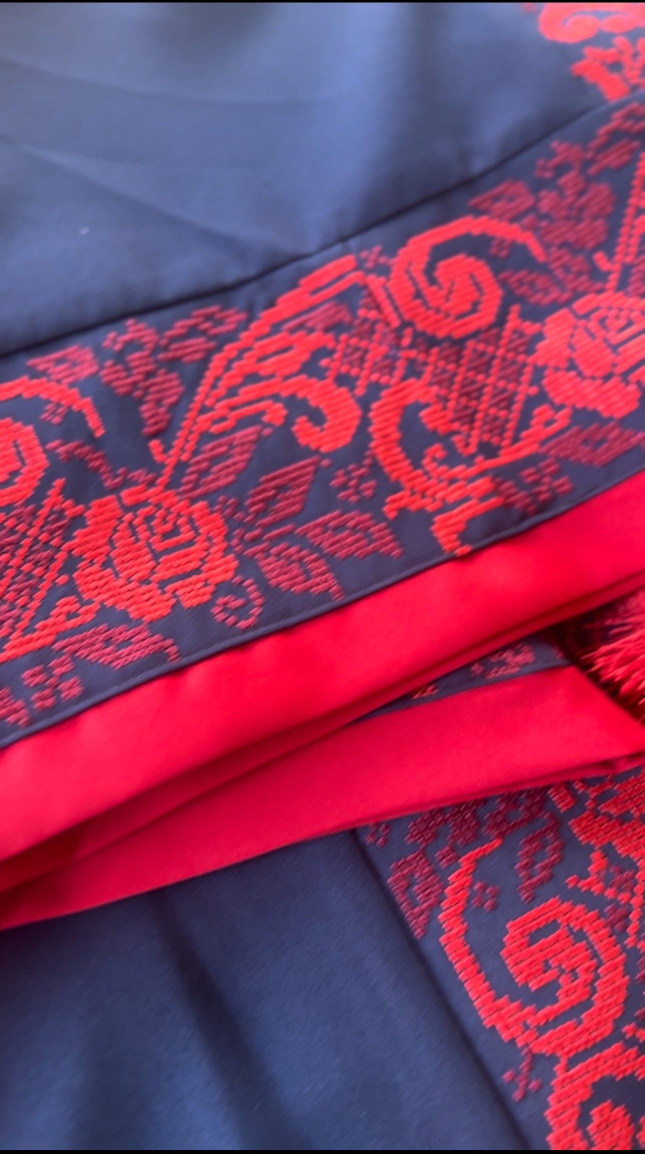 Elegant navy blue thobe and red thobe with matching satin belt