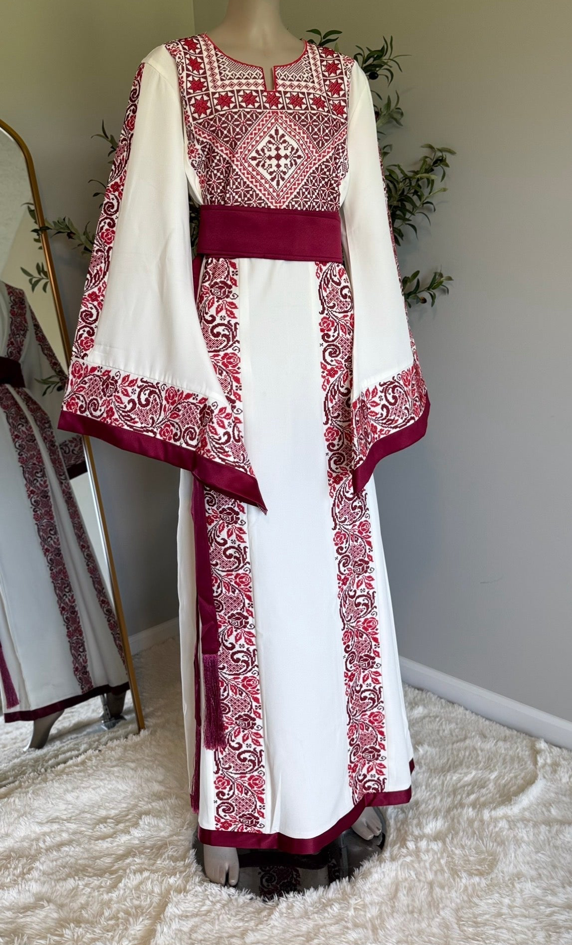 Traditional white, burgundy, and red embroidered thobe