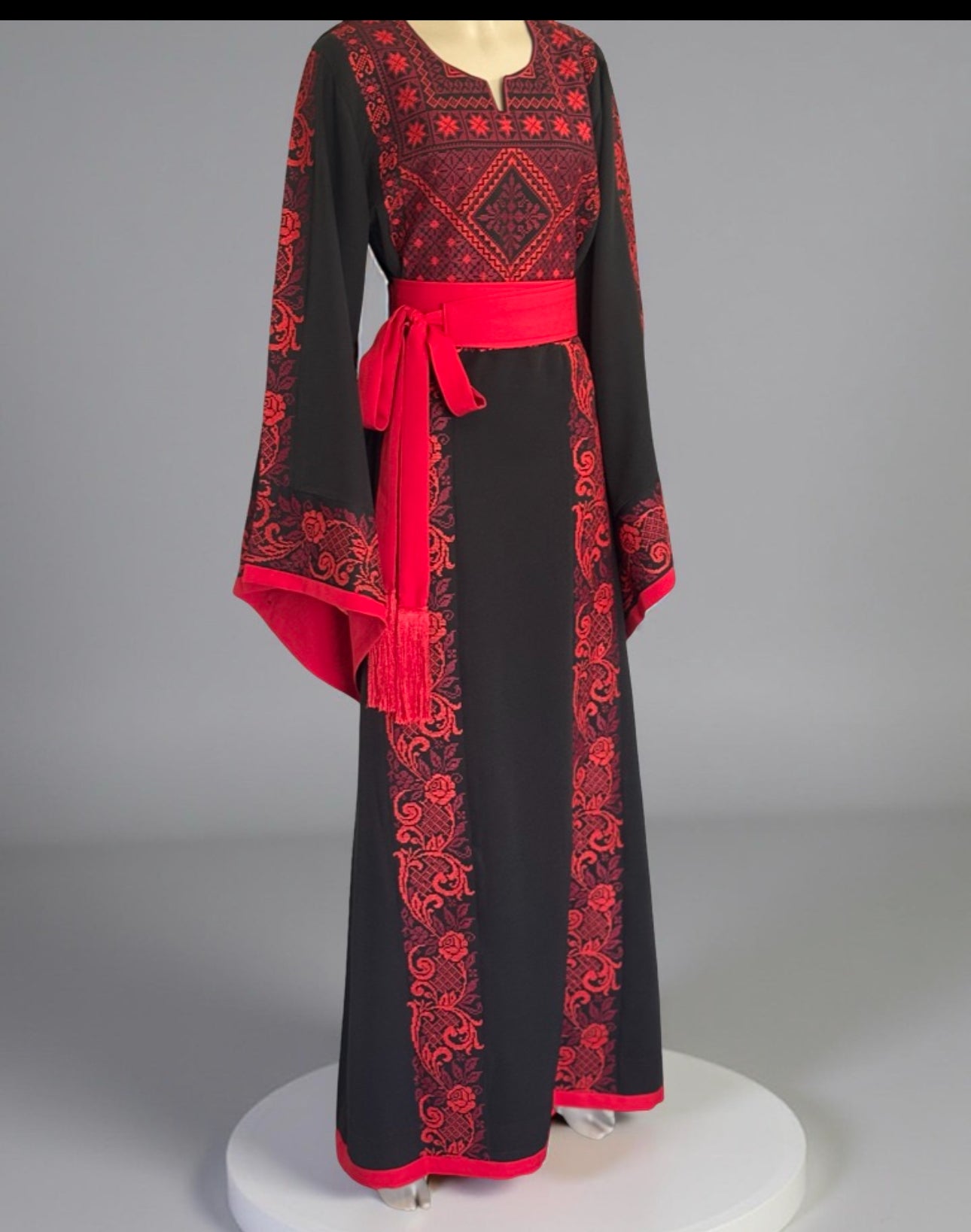 Elegant black and red thobe with matching satin belt