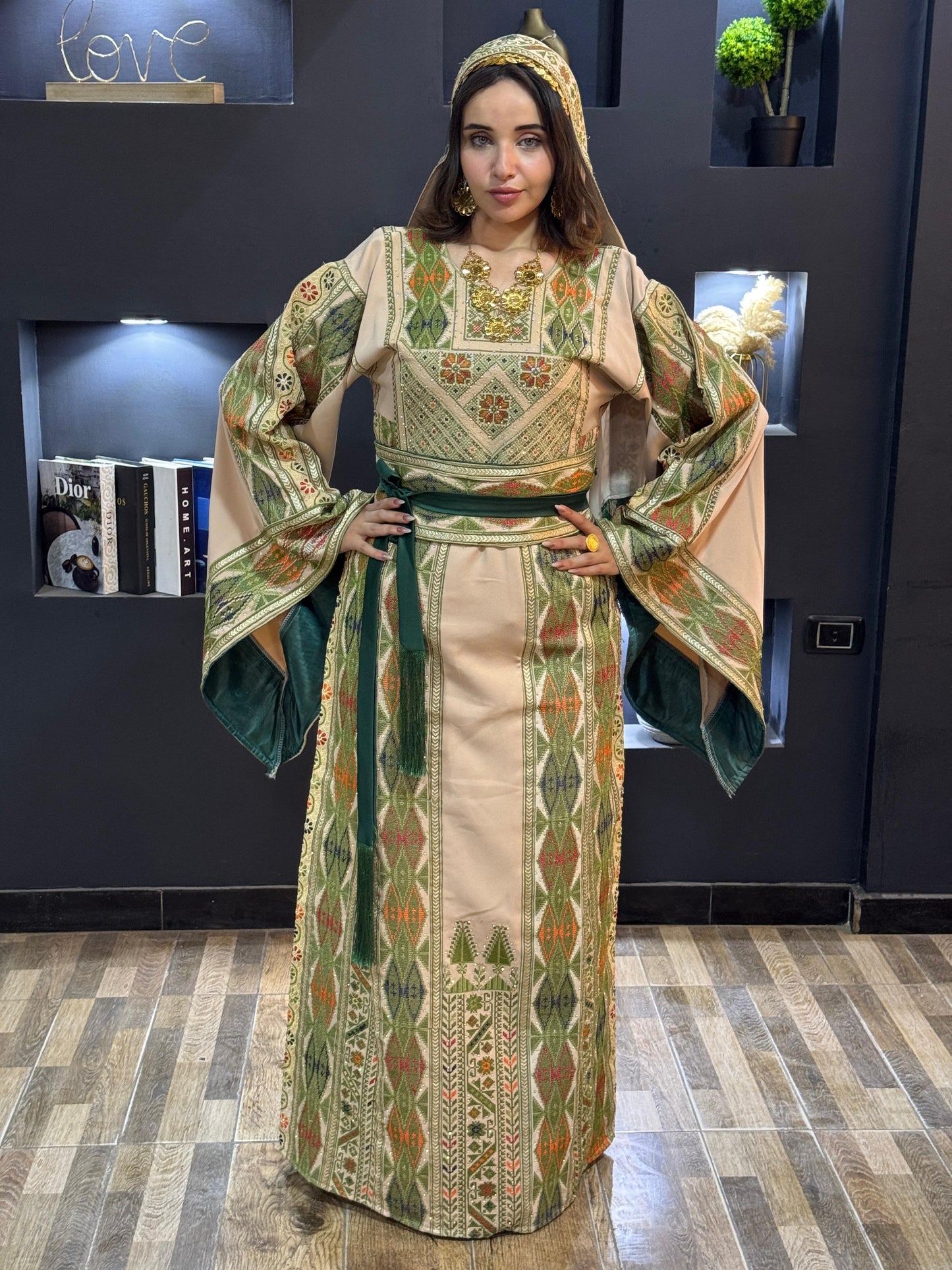 Oof white thobe with green embroidered