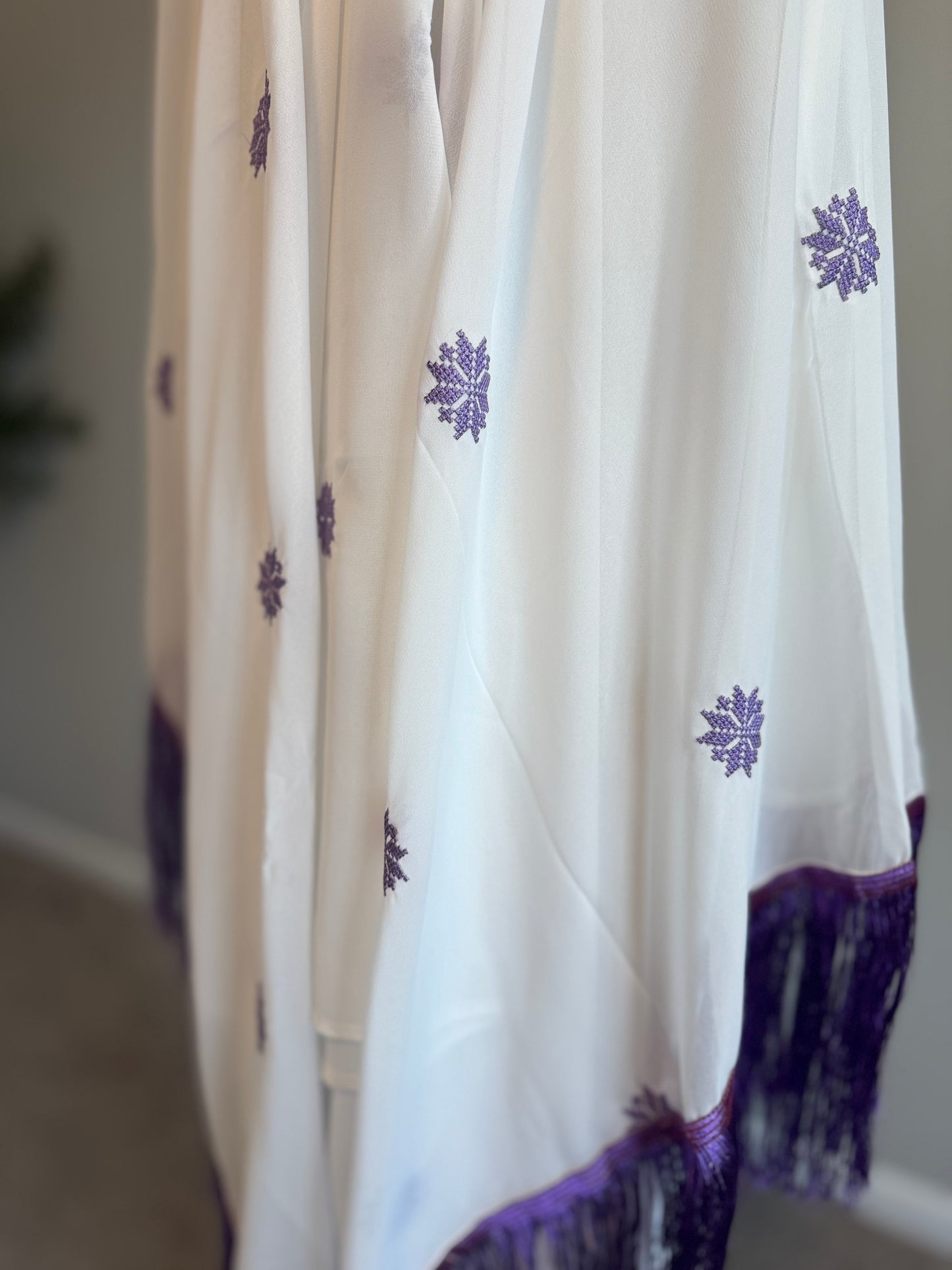 White headscarf with purple embroidery