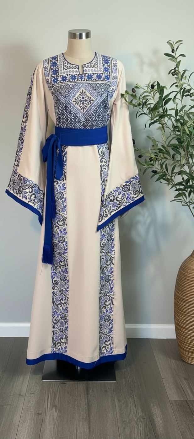 Beige thobe with royal blue embroidery and matching satin belt