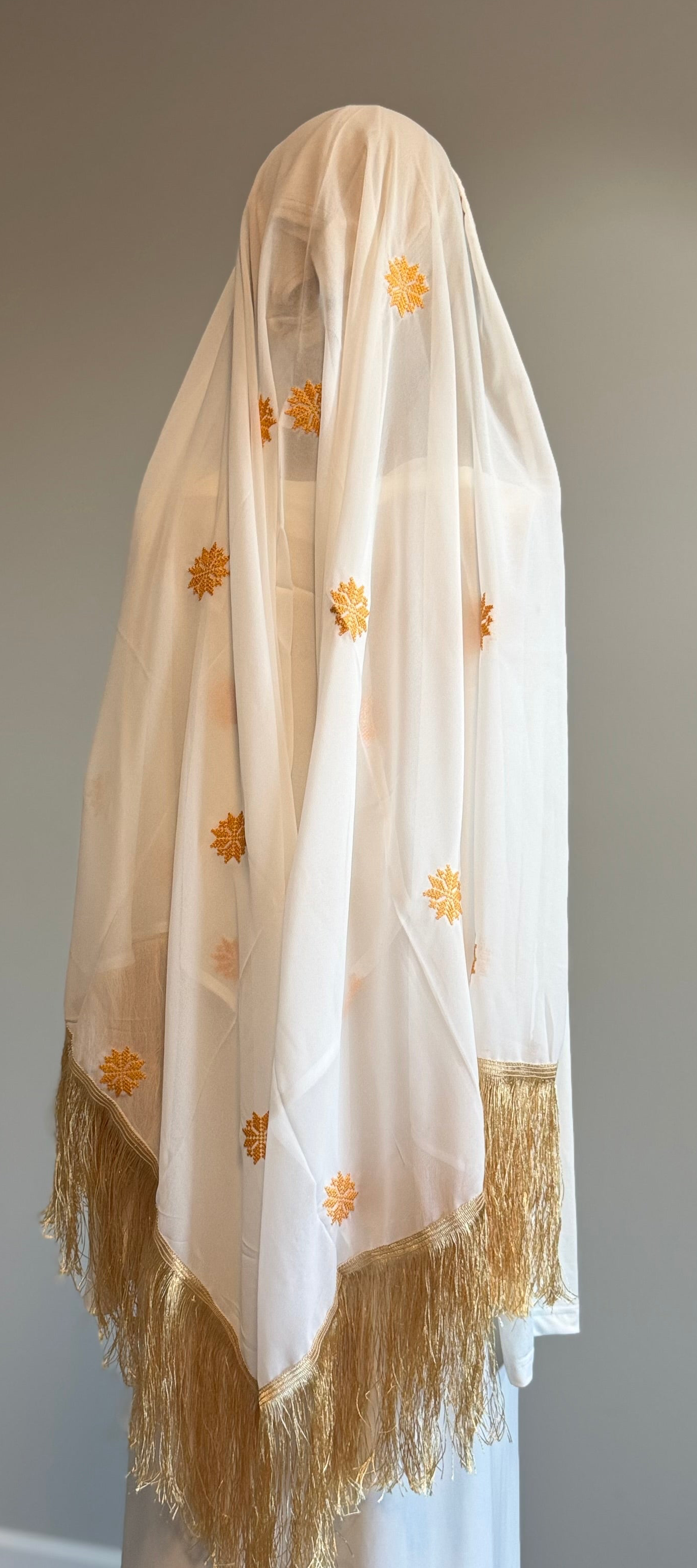 White headscarf with gold embroidery