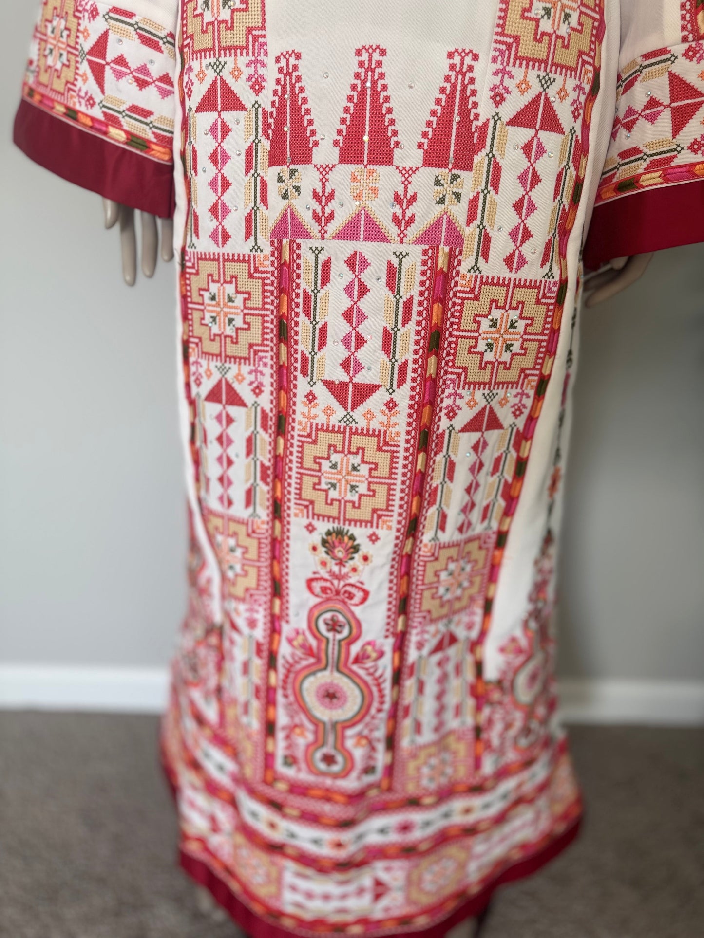 White and red thobe