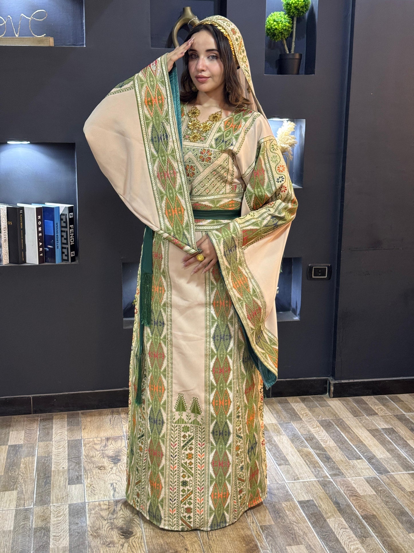 Oof white thobe with green embroidered
