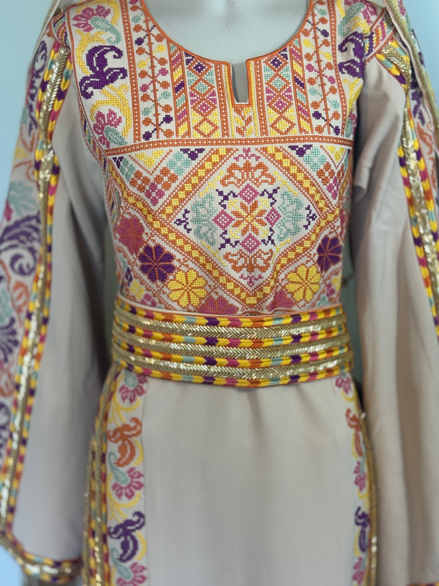 Beige thobe with beautiful colors