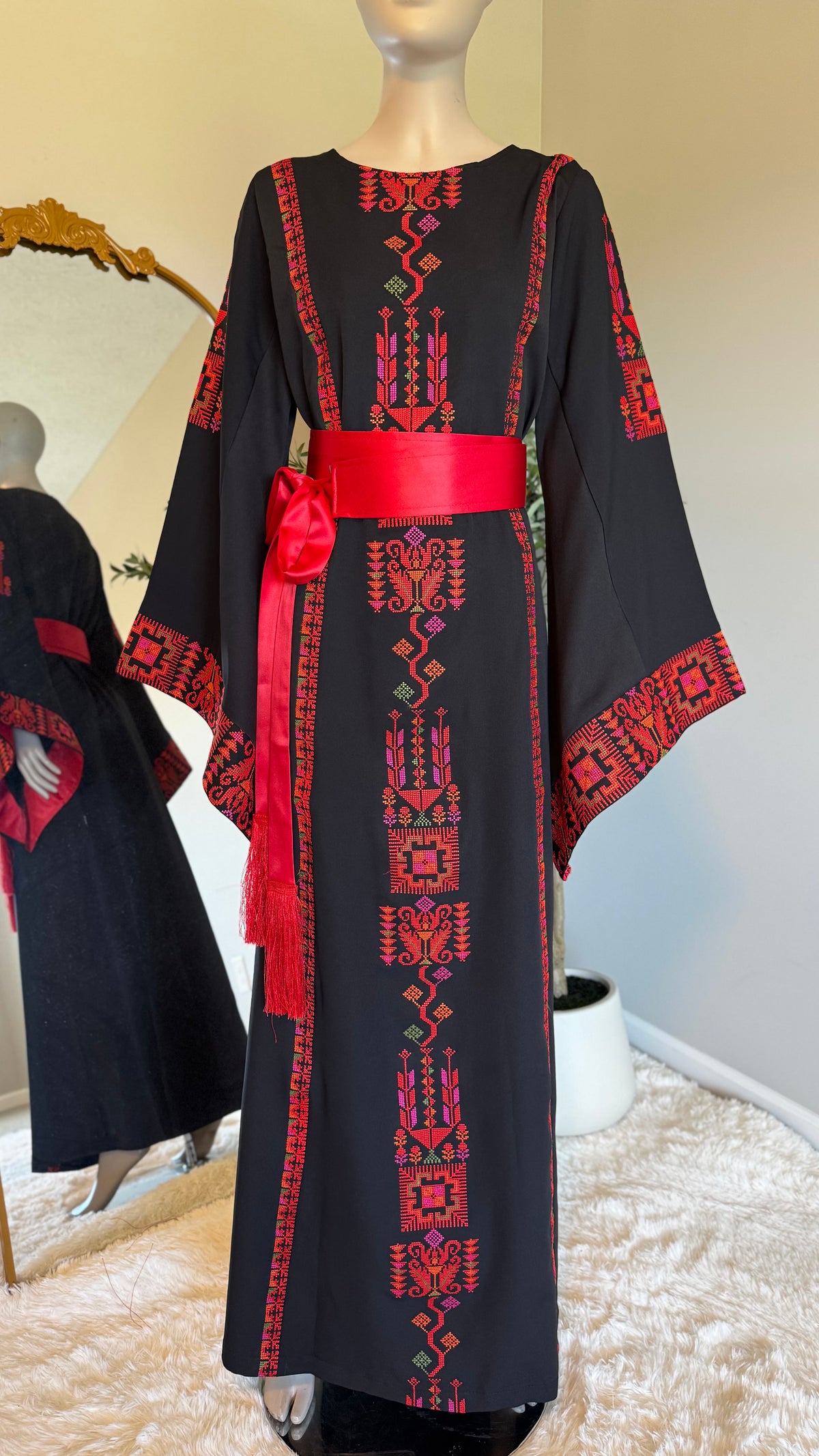Black embroidered dress with matching belt