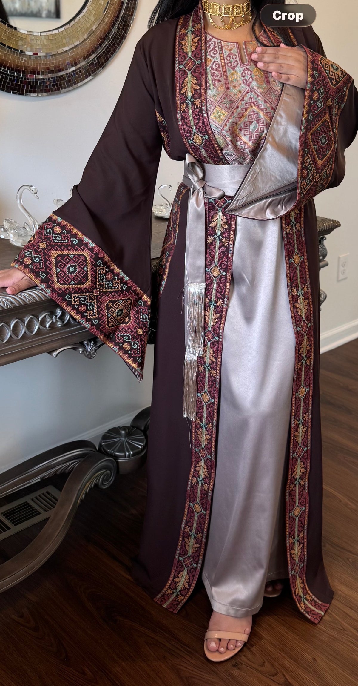 Brown and beige embroidered two-piece abaya with a matching belt.