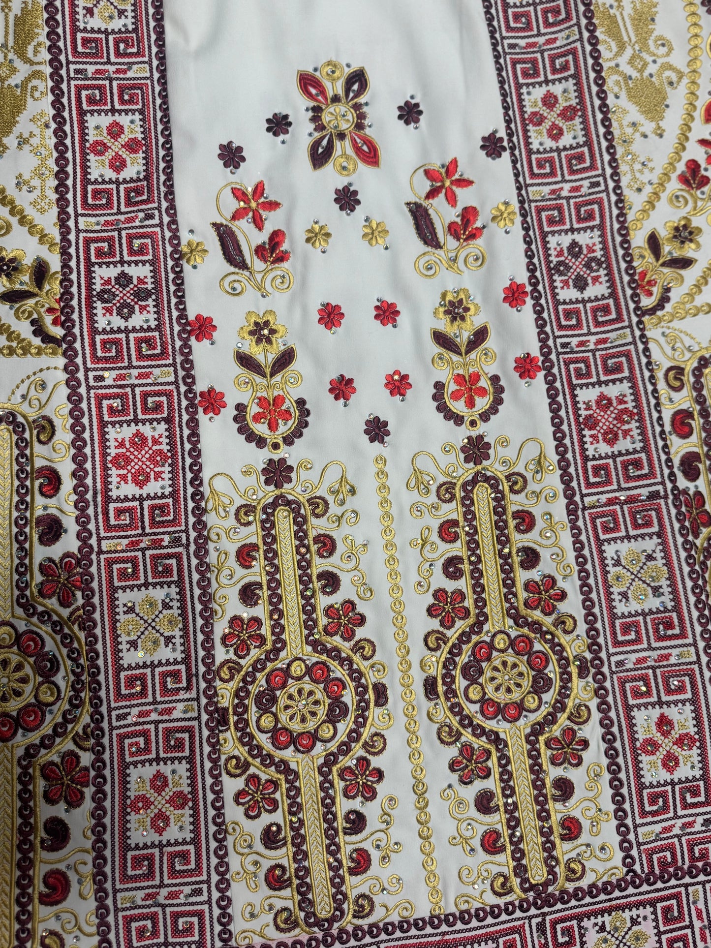 White and red thobe
