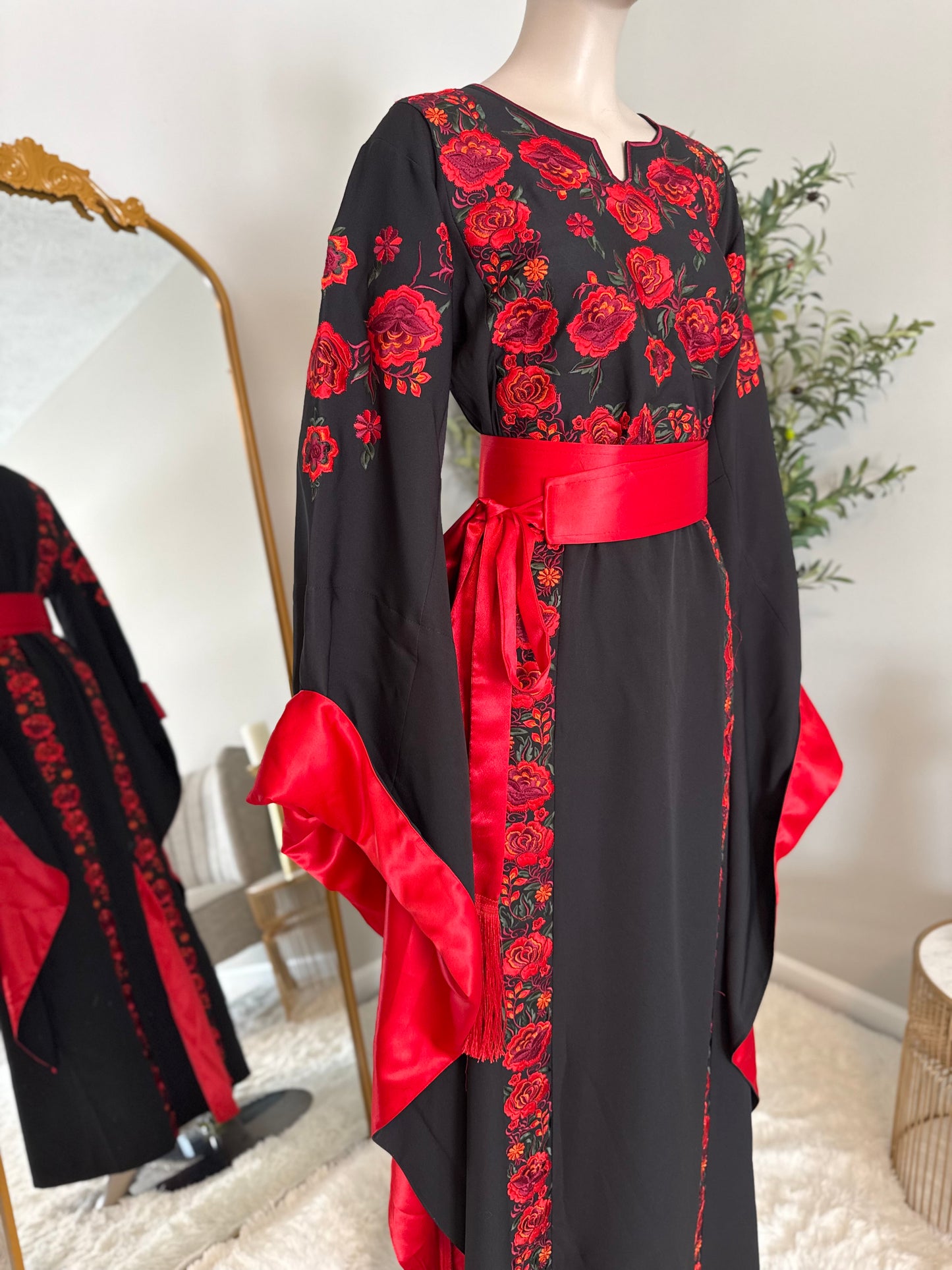 Black thobe with colorful embroidery