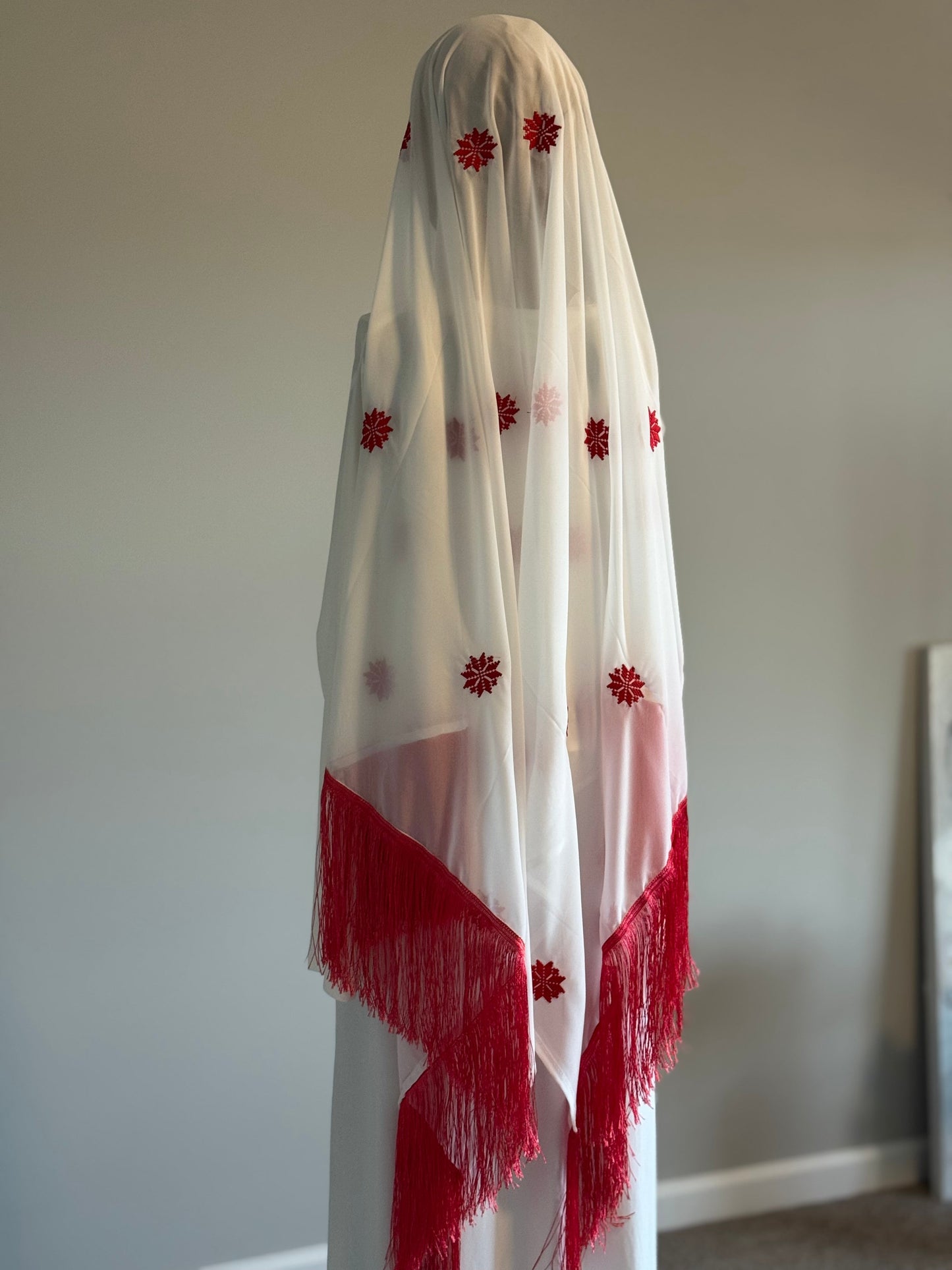 White headscarf with red embroidery