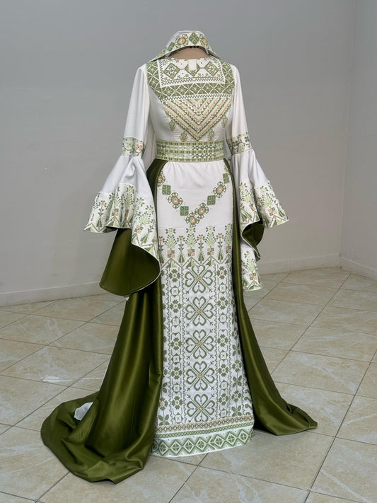 Embroidered white and green dress with overskirt.