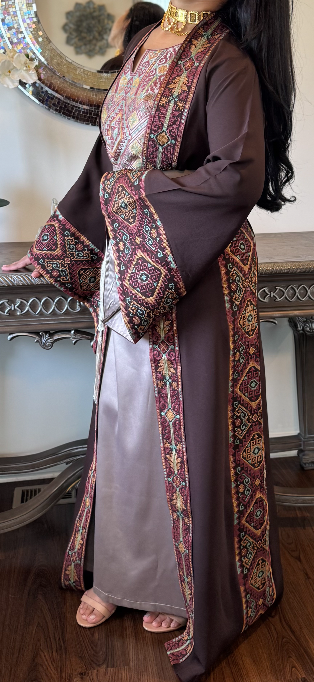 Brown and beige embroidered two-piece abaya with a matching belt.