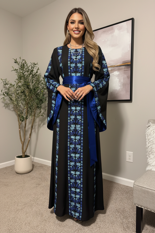 A beautiful black and royal blue dress with fashionable sleeves.