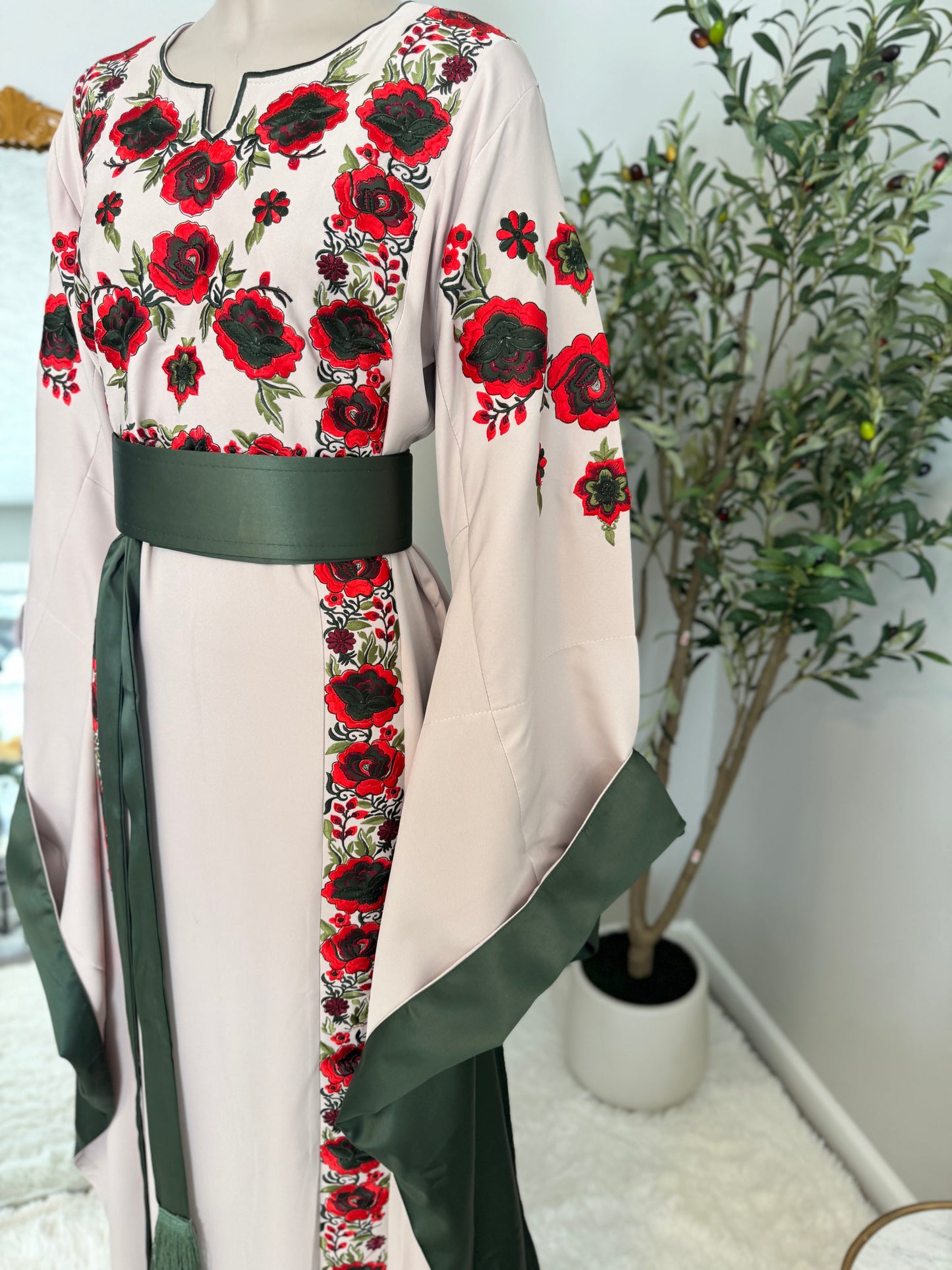 Beige thobe with colorful embroidery