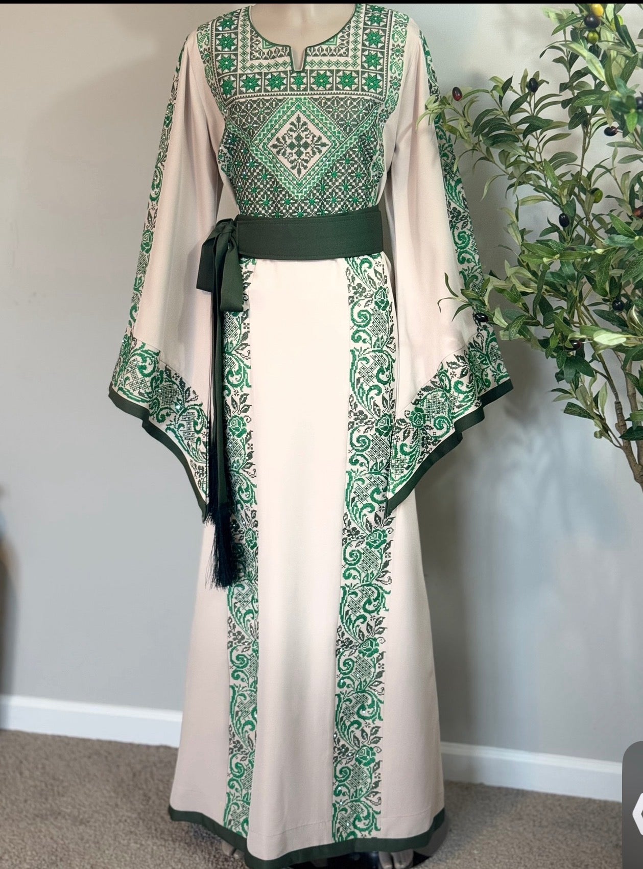 Beige thobe with green embroidery