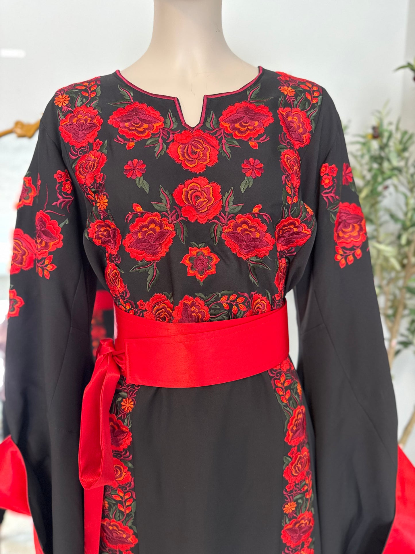 Black thobe with colorful embroidery