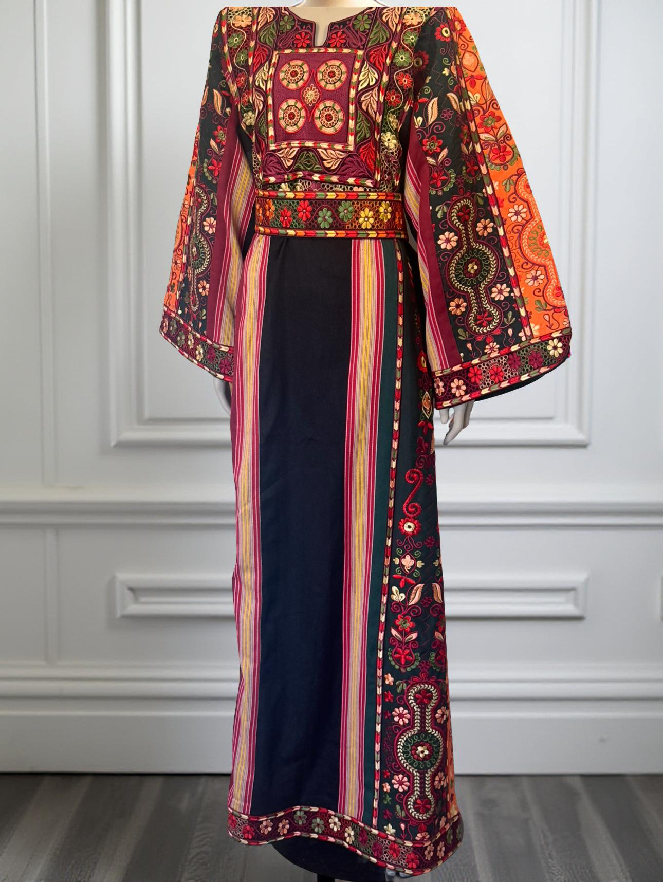 Black majdalwee thobe with orange and green fabric.