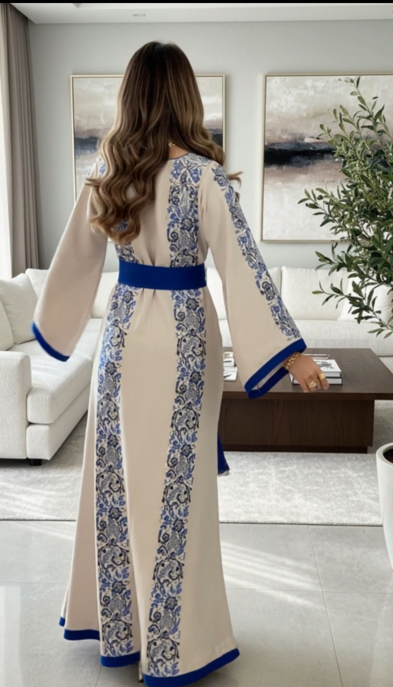 Beige thobe with royal blue embroidery and matching satin belt