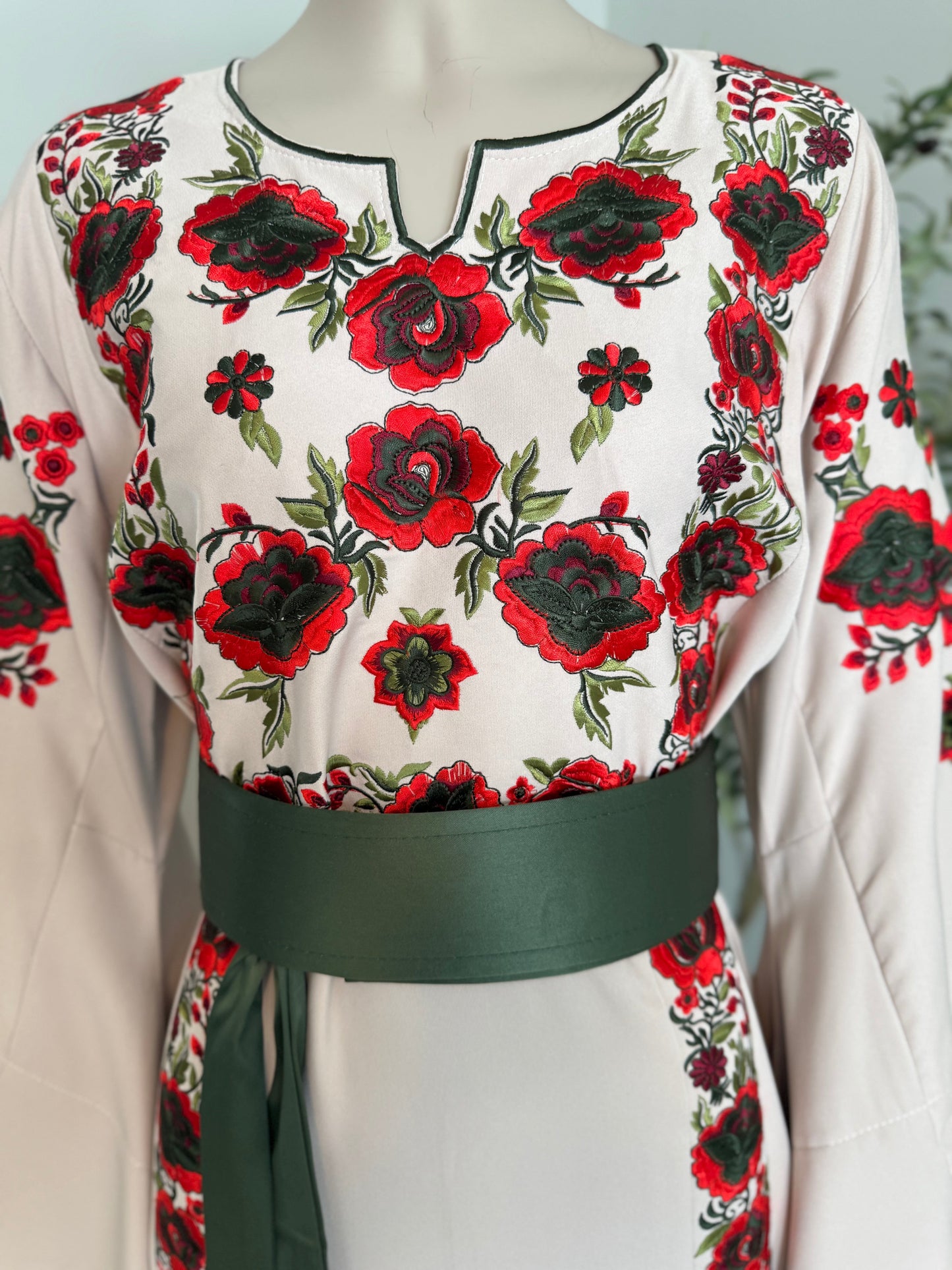 Beige fabric thobe with colorful embroidery