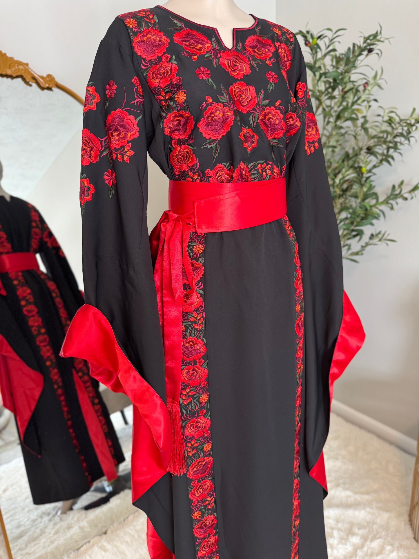 Black thobe with colorful embroidery
