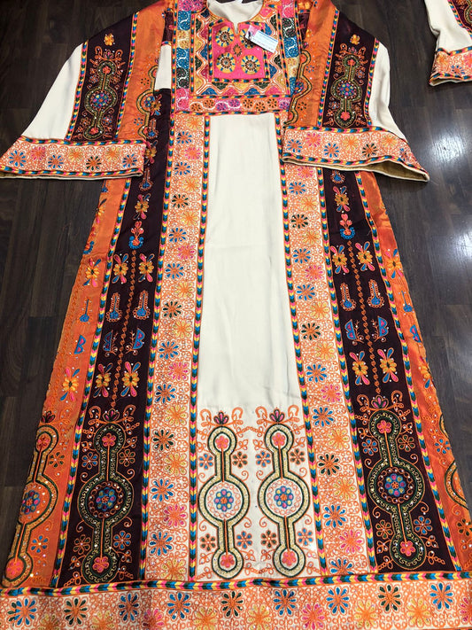 Off-white thobe with orange and burgundy fabric